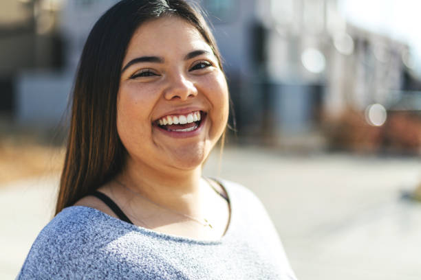 Young Woman of Hispanic Ethnicity Part smiling